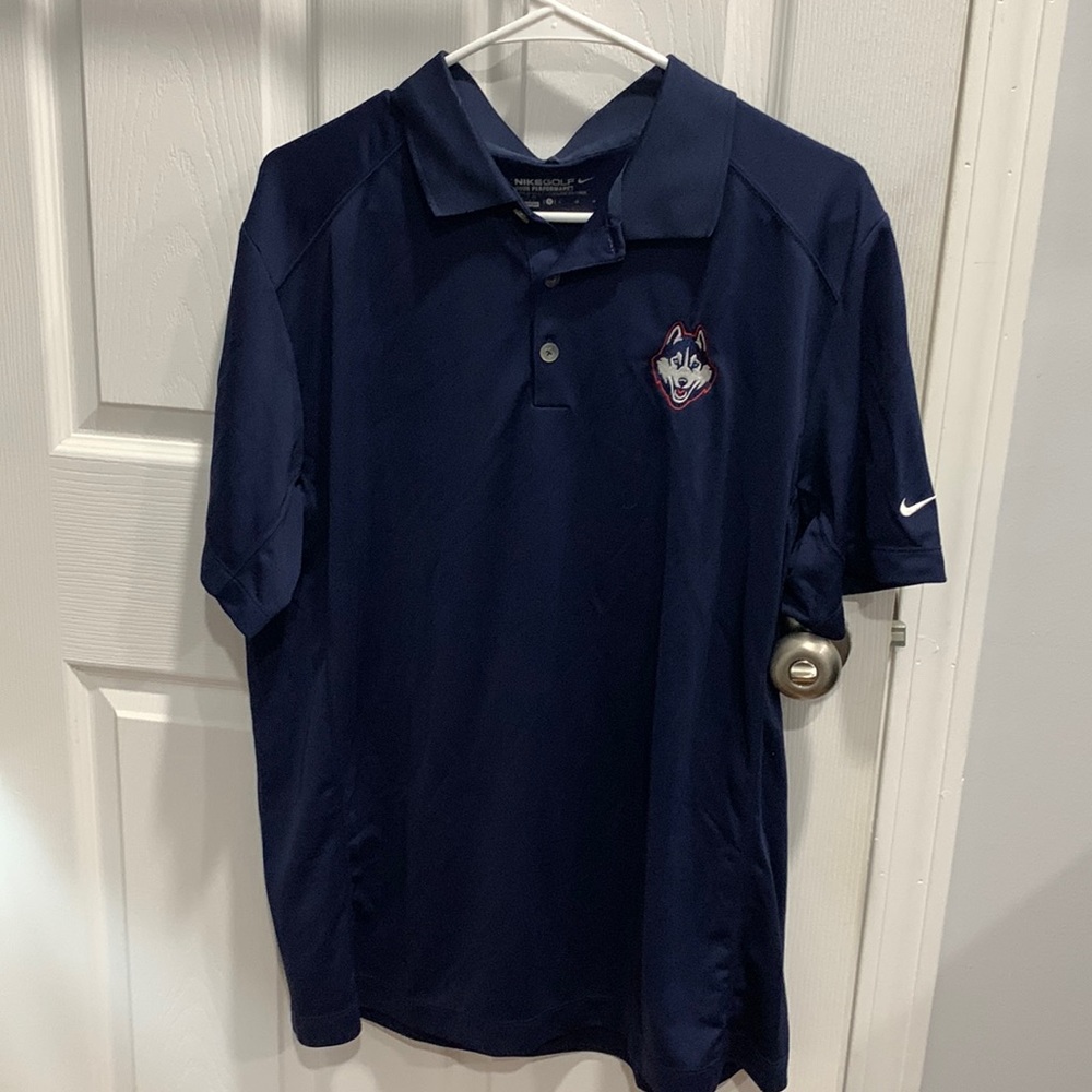 Nike golf polo - UConn branded. Never worn, excellent condition. Size Large.